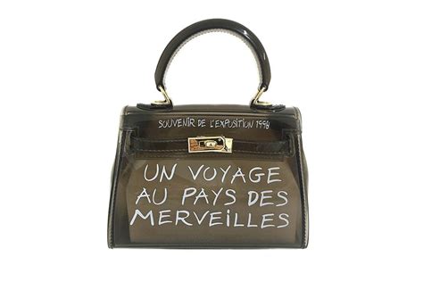 un voyage au pays des merveilles hermes price|hermes voyager bag.